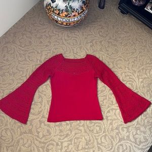 Venus red bell sleeve knit sweater. 58% cotton,38% acrylic, 4% polyester. Size M